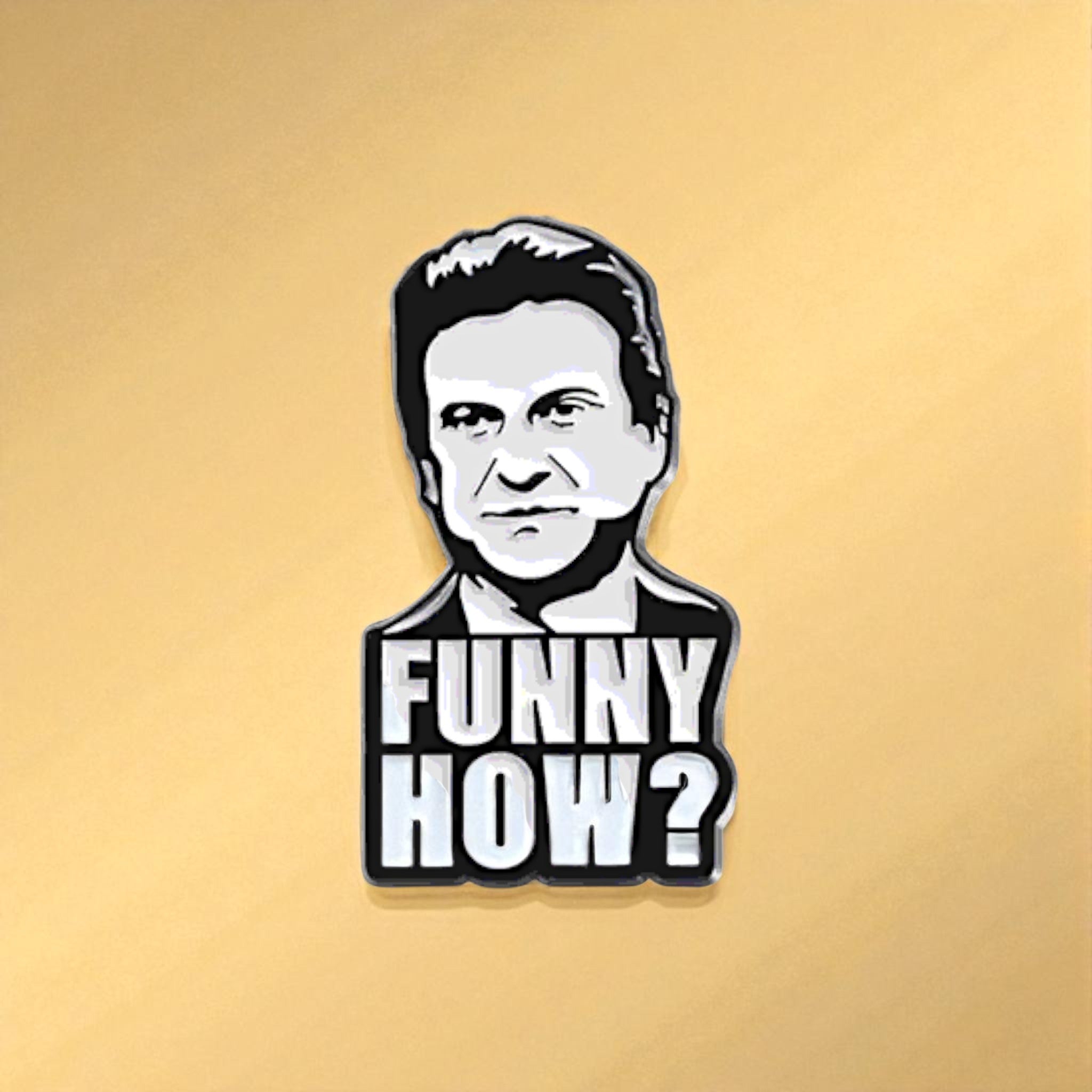 Goodfellas Pin with a face design and 'FUNNY HOW?' text on a gold background
