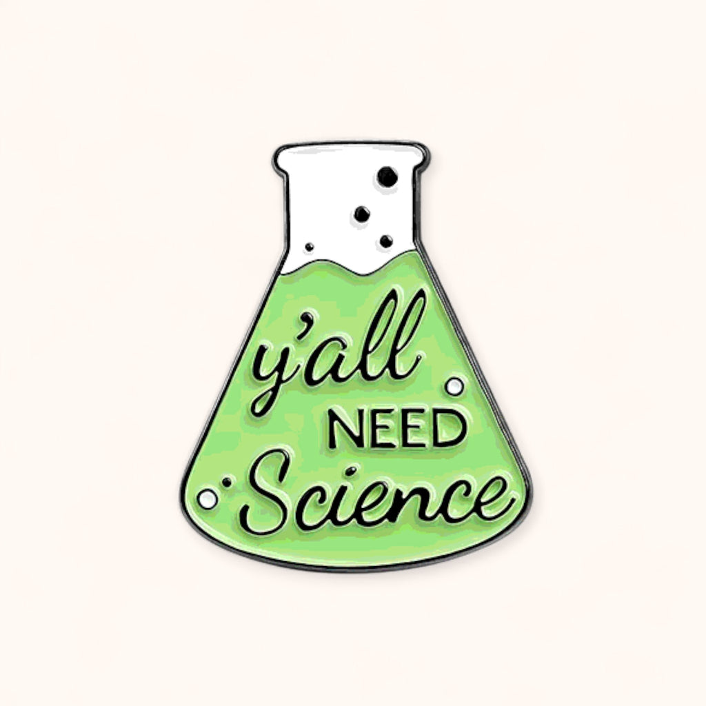 Green beaker-shaped enamel pin with 'y'all need science' text 