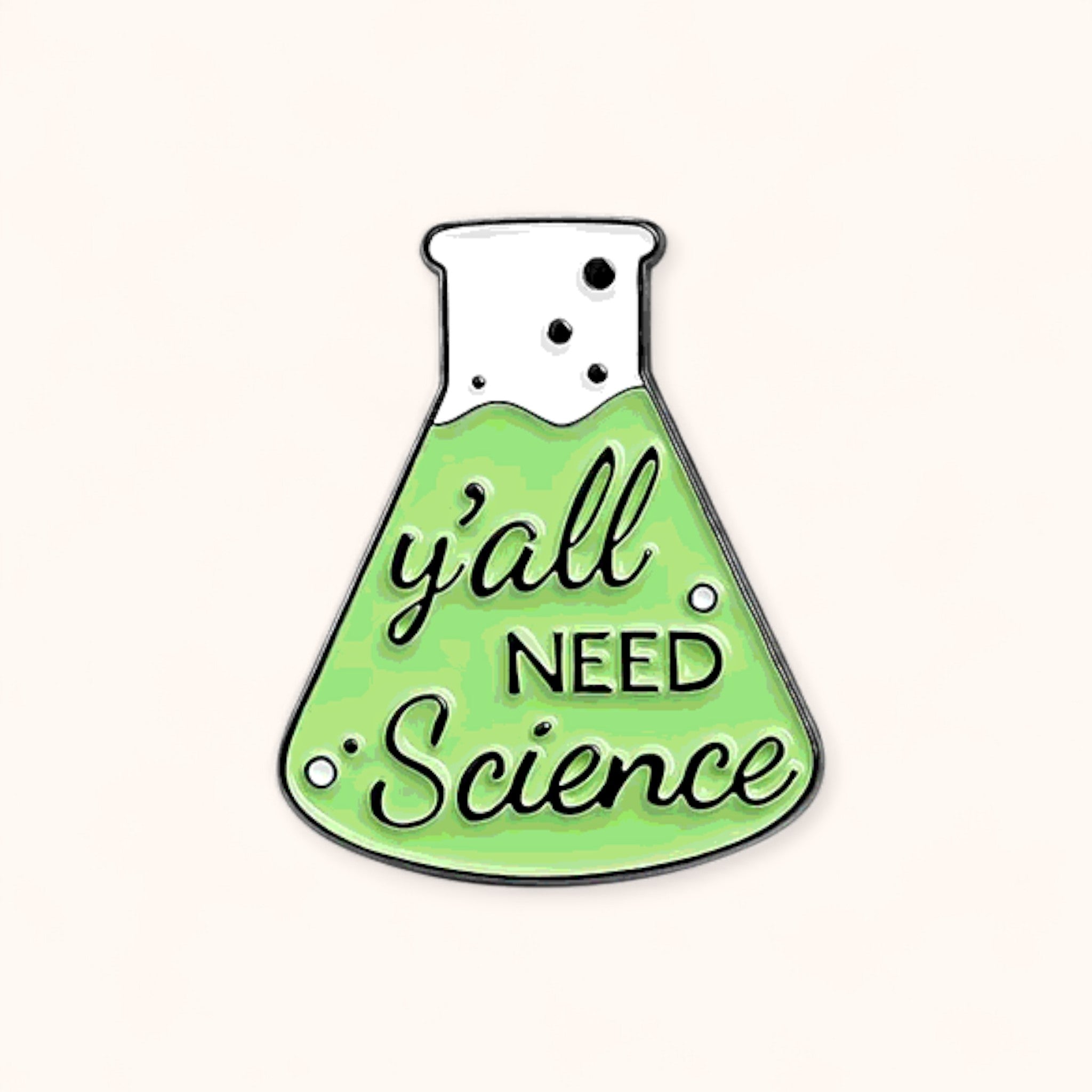 Green beaker-shaped enamel pin with 'y'all need science' text 