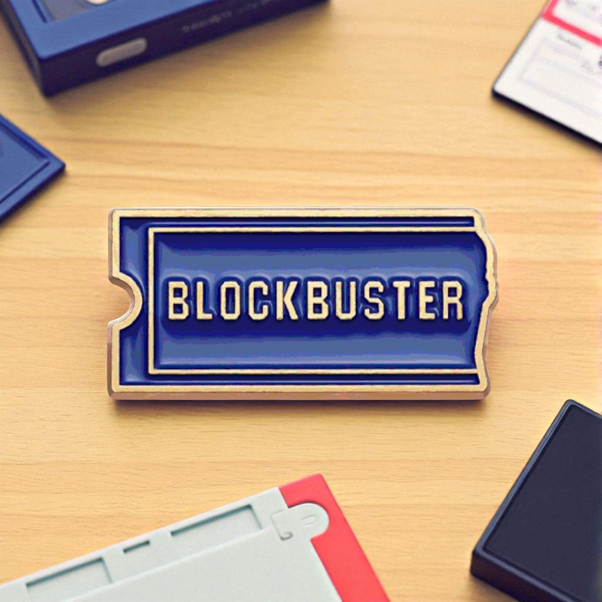 Retro Blockbuster movie ticket-shaped enamel pin