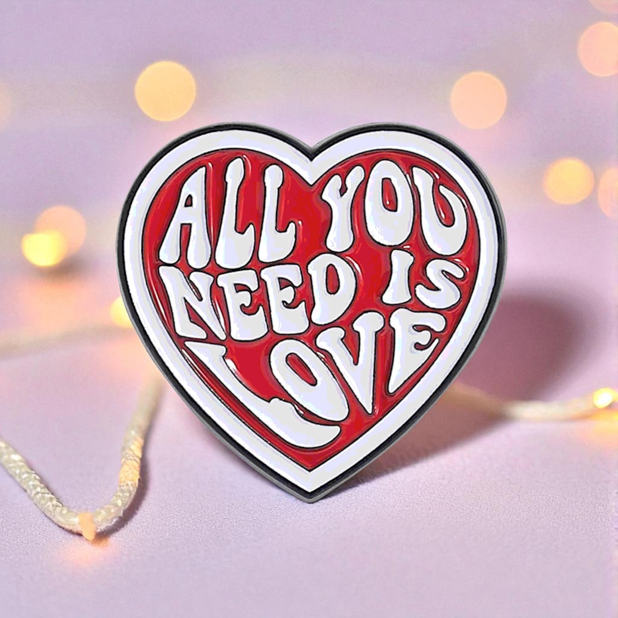 Heart-shaped pin with 'All You Need Is Love' Beatles Pin